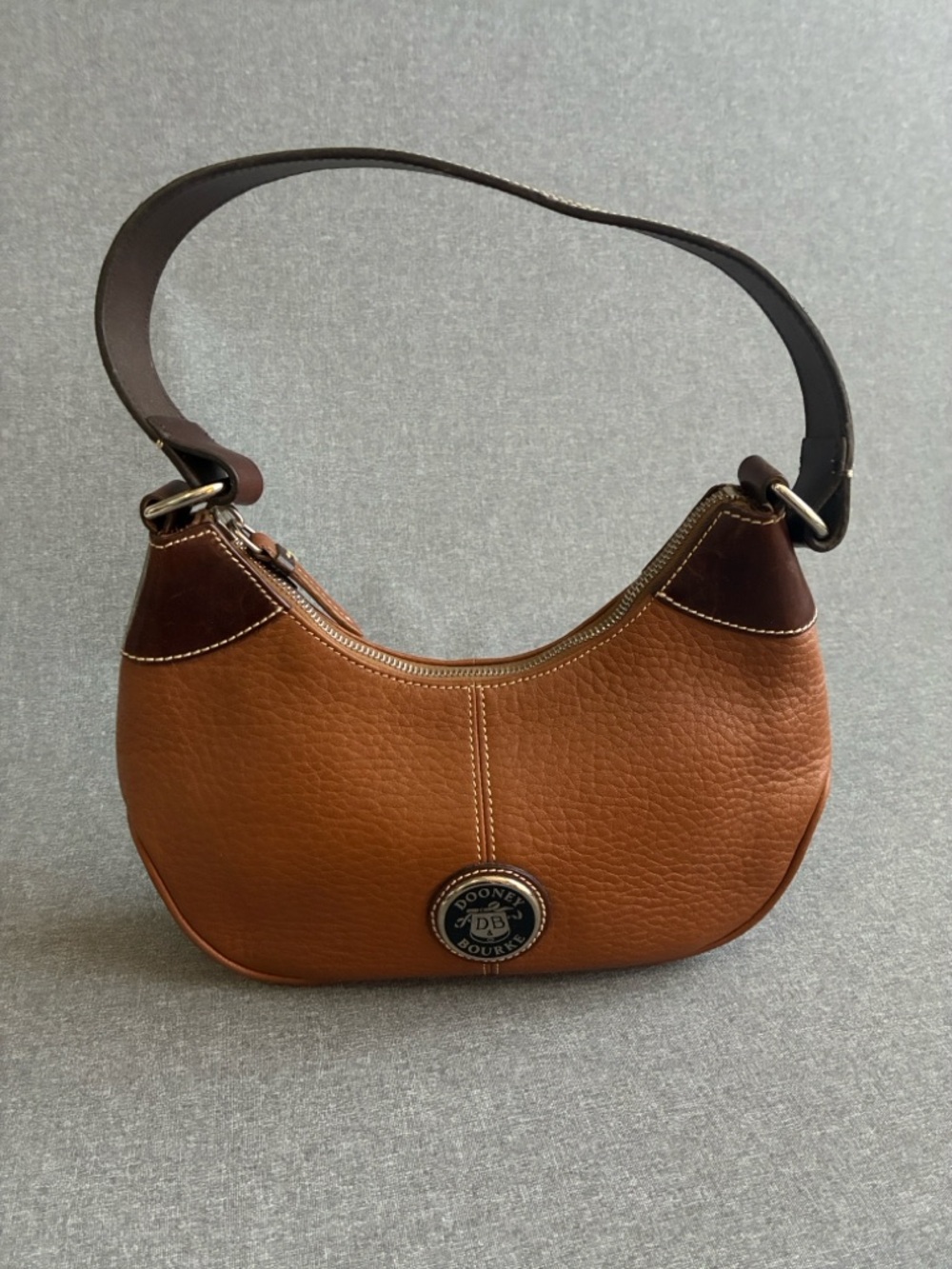 Dooney & Bourke Brown Pebbled Leather Crossbody with Silver Logo Coin